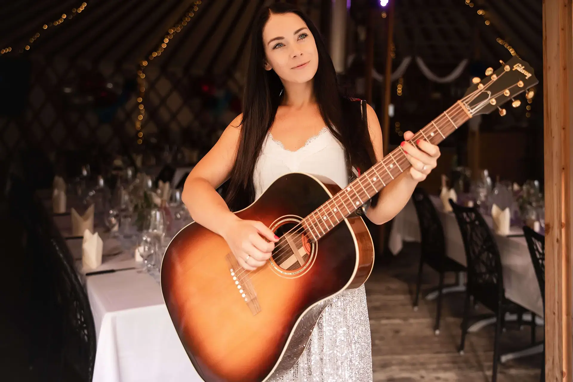 Helen Pfaff — Chitarrista